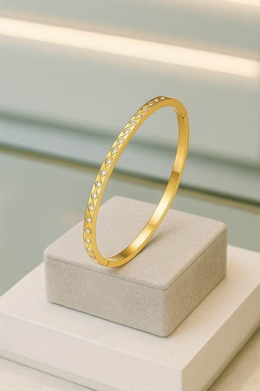 18k gold plated bracelet with diamond design and cubic zirconia. 6cm Code 88164