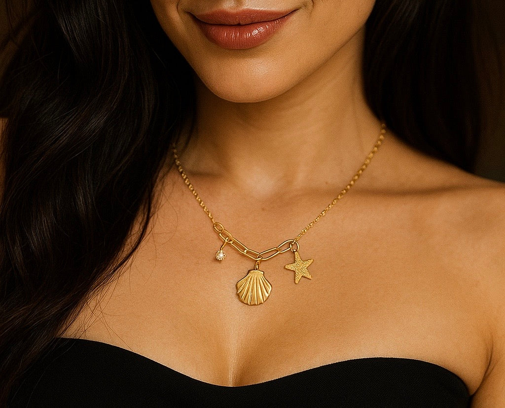 Beautiful Necklace with three character charms, seashell, starfish & cubic zirconia 40+5cm. Code 90242