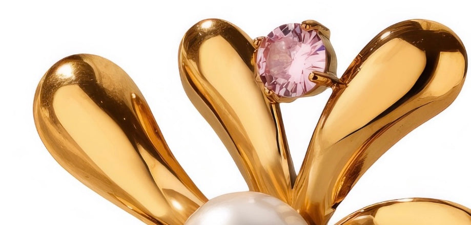 Stunning flower ring with pearl & cubic zirconia details Adjustable fit. Code 90123