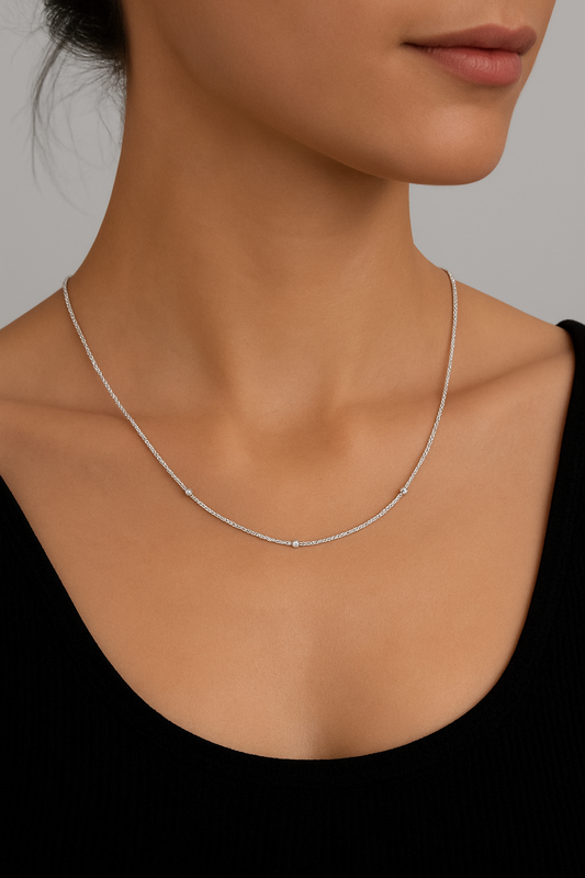 Stylish & elegant silver chain with intertwined ball effect. 20 inch length