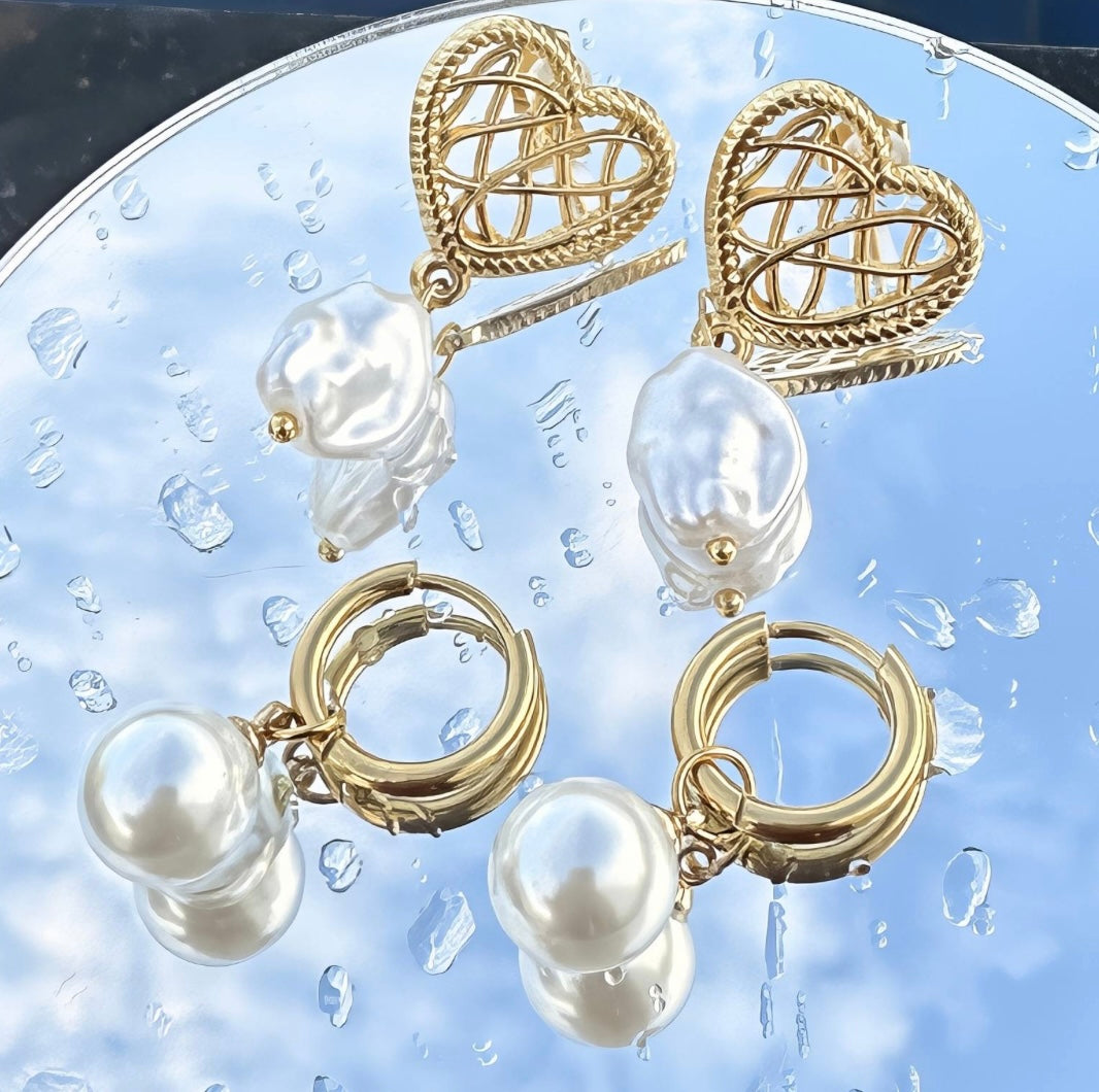 Stylish & elegant imitation pearl drop earrings 1.5 x 3cm. Code 87736