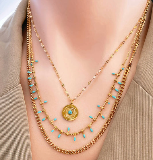 Evil eye necklace with cubic zirconia and blue stone charms attached. Perfect for summer wear. 40/48+6 cm. Code 90705