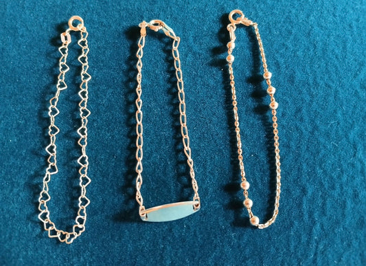 Beautiful child’s silver bracelet set x 3. Link design, name bracelet & charm bracelet