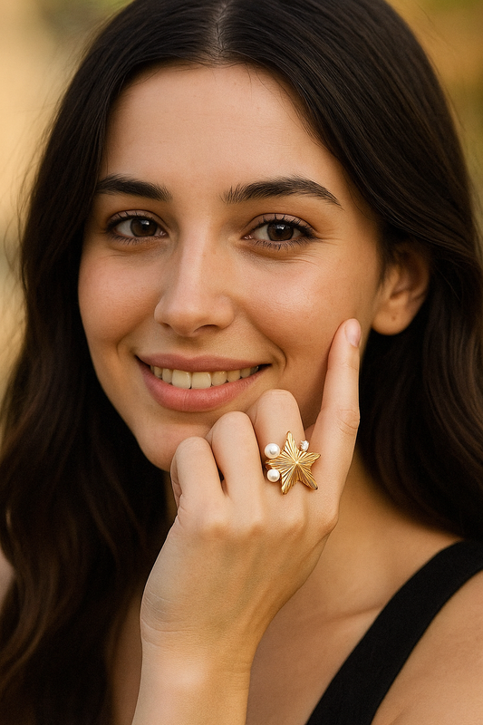 Beautiful star ring inlaid with cubic zirconia & imitation Pearls. Adjustable fit. Code 90131