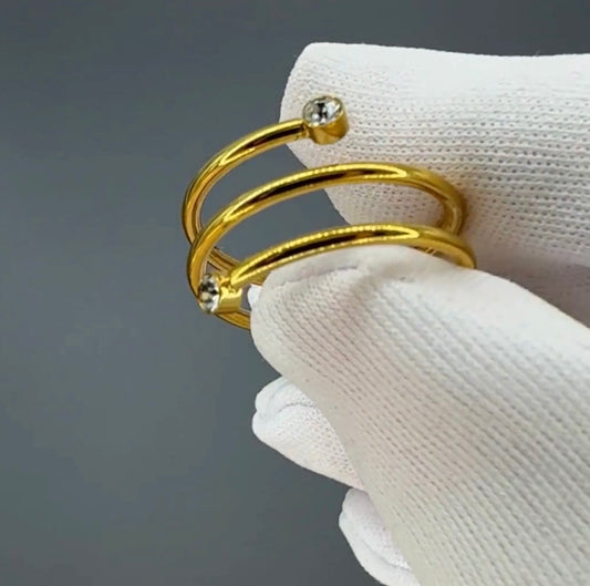 Beautiful gold plated ring with cubic zirconia stones. Adjustable fit. Code 87447