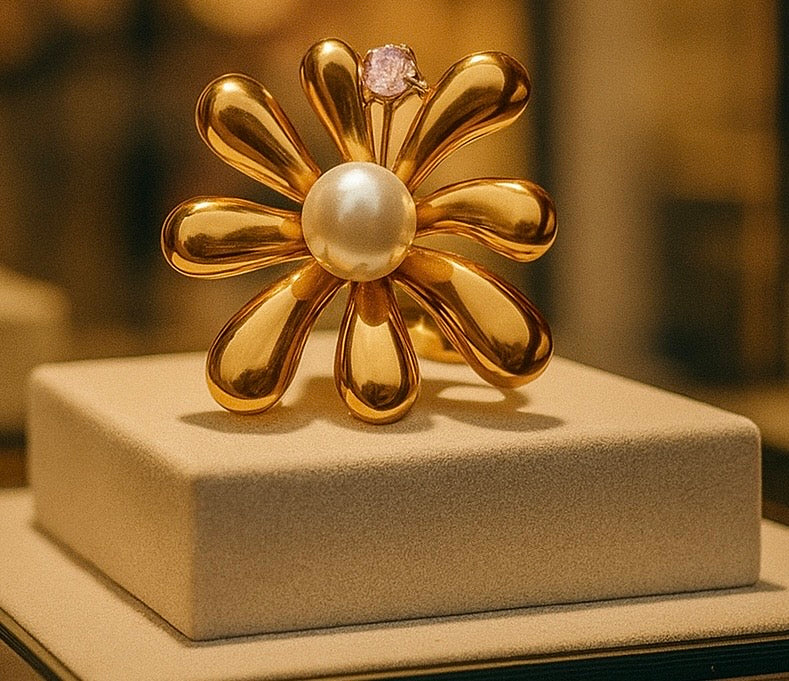 Stunning flower ring with pearl & cubic zirconia details Adjustable fit. Code 90123